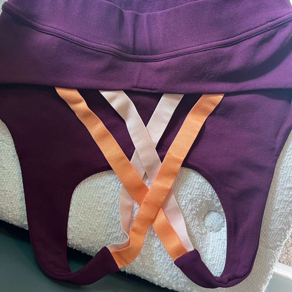Fabletics woman's sports bra in Purple and Orange